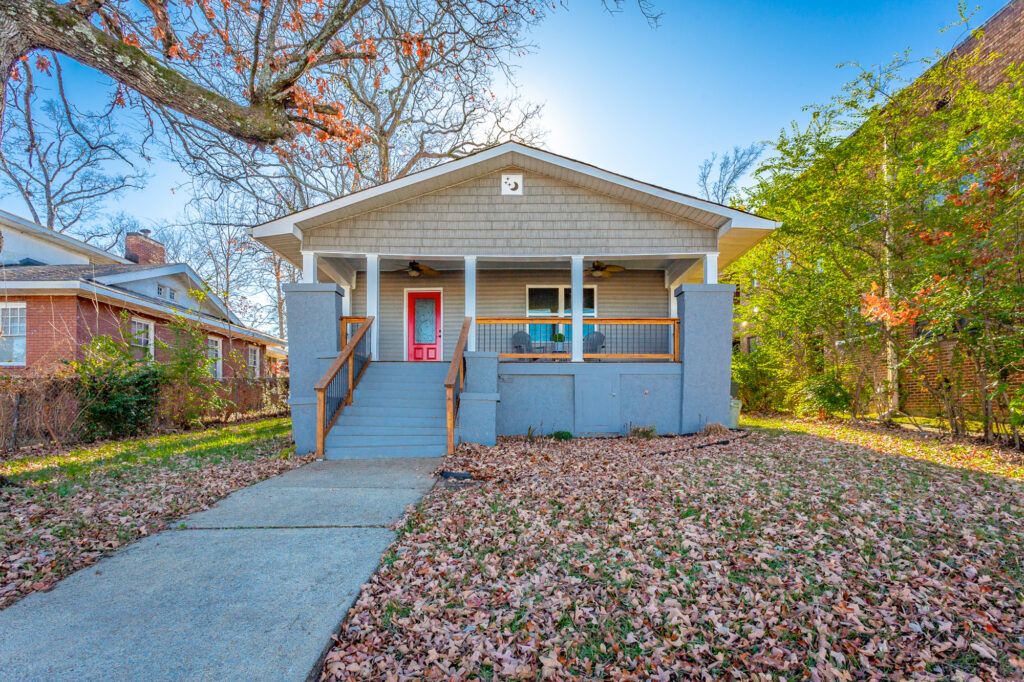 1404 Duncan Ave Chattanooga TN 37404, Charming Grey Cottage Home for sale with generous front porch and red door.