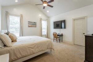 Master Bedroom cathedral ceiling white walls beige carpet