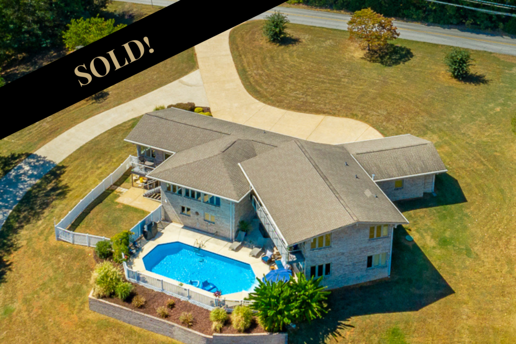 Sold Back of 6530 Fairview Road a brick ranch home with inground pool on a hill