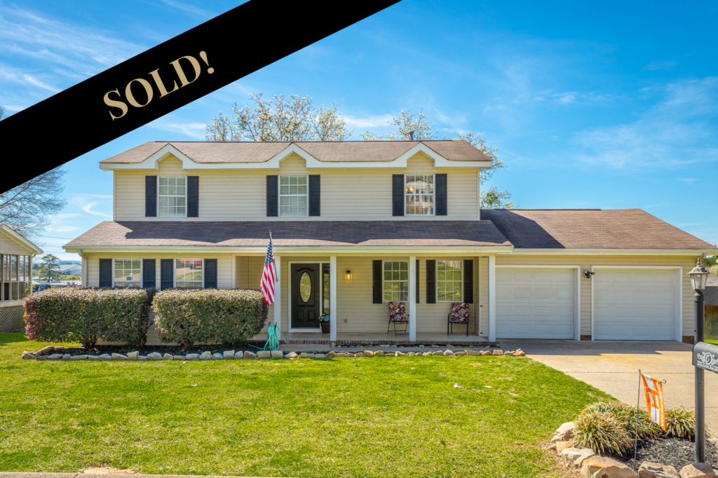 Sold front of 6736 Jordan Run a traditional 2 story home with front porch and 2 car garage
